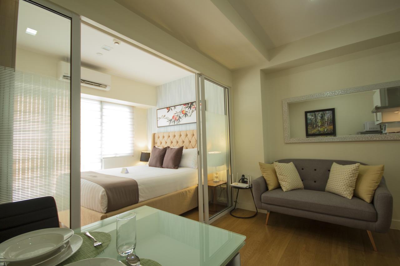 Siglo Suites @ The Acqua Private Residences Мандалуйонг Экстерьер фото